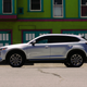 Again, there I was minding my own business, getting a shot of a interesting building, and some maroon parks another CX-9 right in front of me!